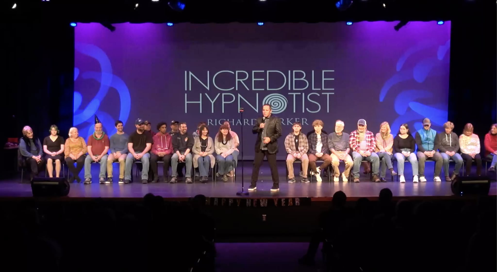 Comedy hypnotist live on stage